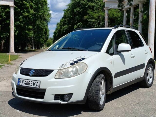Белый Сузуки СХ4, объемом двигателя 1.6 л и пробегом 200 тыс. км за 5238 $, фото 1 на Automoto.ua