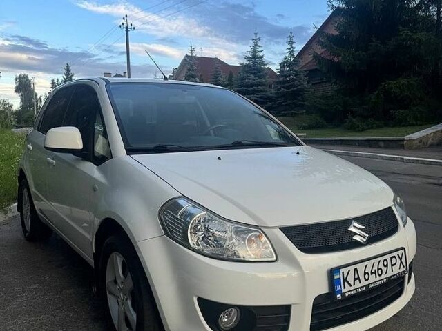 Белый Сузуки СХ4, объемом двигателя 1.59 л и пробегом 118 тыс. км за 7900 $, фото 1 на Automoto.ua
