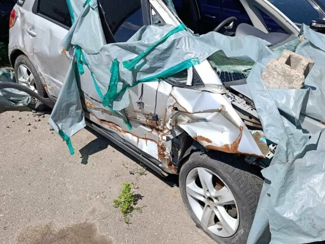 Белый Сузуки СХ4, объемом двигателя 1.6 л и пробегом 170 тыс. км за 1500 $, фото 1 на Automoto.ua