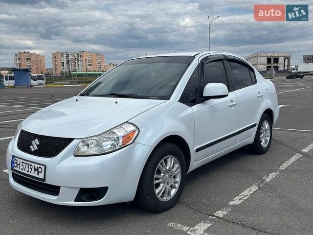 Белый Сузуки СХ4, объемом двигателя 2 л и пробегом 196 тыс. км за 5600 $, фото 1 на Automoto.ua