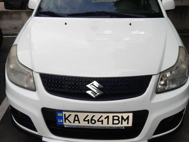 Белый Сузуки СХ4, объемом двигателя 1.6 л и пробегом 187 тыс. км за 7600 $, фото 1 на Automoto.ua