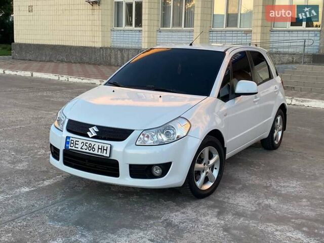 Белый Сузуки СХ4, объемом двигателя 1.59 л и пробегом 124 тыс. км за 8000 $, фото 1 на Automoto.ua