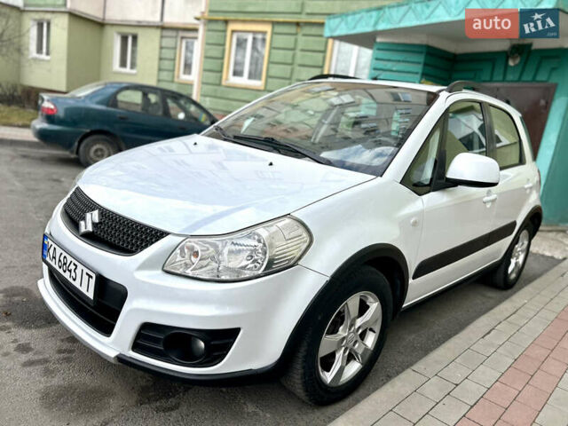 Белый Сузуки СХ4, объемом двигателя 1.6 л и пробегом 186 тыс. км за 8999 $, фото 1 на Automoto.ua