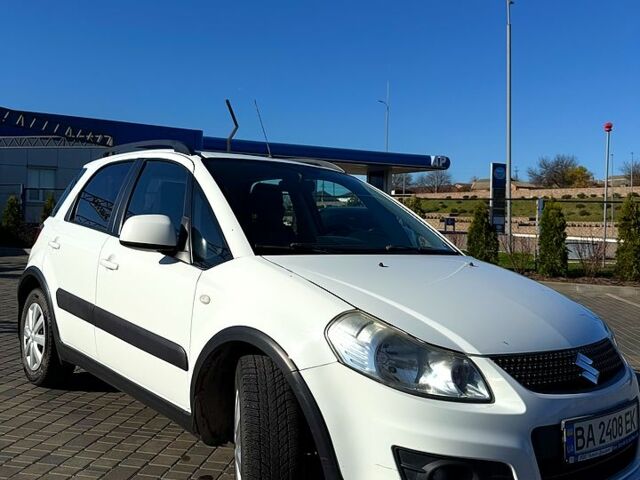 Белый Сузуки СХ4, объемом двигателя 1.6 л и пробегом 125 тыс. км за 9500 $, фото 1 на Automoto.ua
