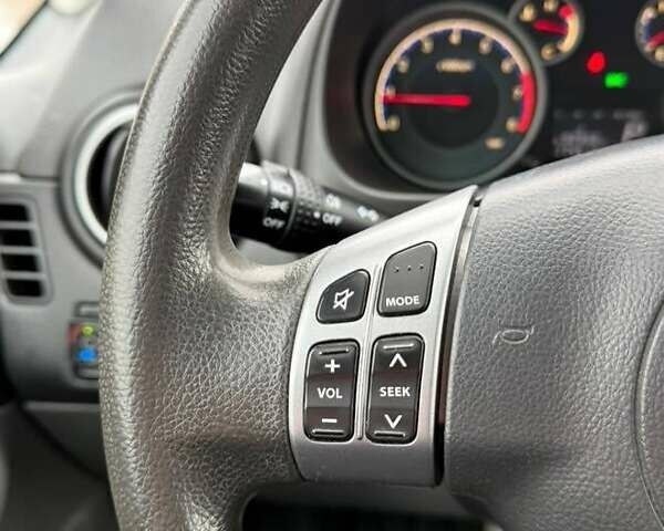 Белый Сузуки СХ4, объемом двигателя 1.59 л и пробегом 176 тыс. км за 7500 $, фото 1 на Automoto.ua