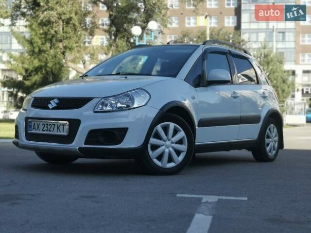 Белый Сузуки СХ4, объемом двигателя 1.6 л и пробегом 125 тыс. км за 9900 $, фото 1 на Automoto.ua