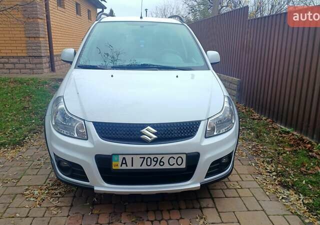 Белый Сузуки СХ4, объемом двигателя 1.6 л и пробегом 98 тыс. км за 11000 $, фото 1 на Automoto.ua