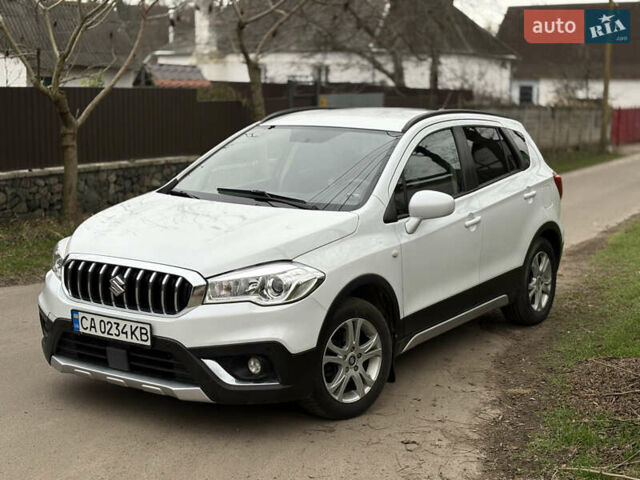 Белый Сузуки СХ4, объемом двигателя 1.59 л и пробегом 130 тыс. км за 13200 $, фото 1 на Automoto.ua