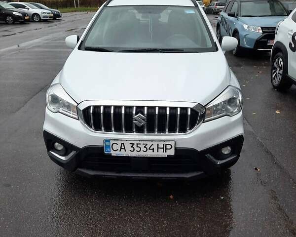 Белый Сузуки СХ4, объемом двигателя 1.59 л и пробегом 365 тыс. км за 12700 $, фото 1 на Automoto.ua