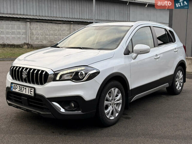 Белый Сузуки СХ4, объемом двигателя 1.59 л и пробегом 56 тыс. км за 18900 $, фото 1 на Automoto.ua