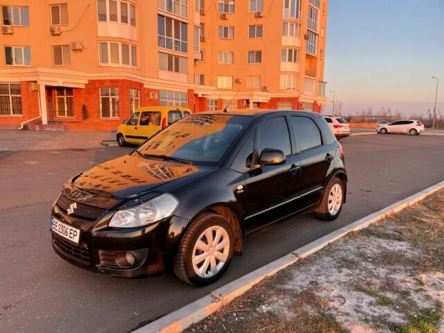 Черный Сузуки СХ4, объемом двигателя 1.9 л и пробегом 250 тыс. км за 5300 $, фото 1 на Automoto.ua
