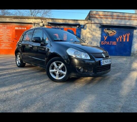 Черный Сузуки СХ4, объемом двигателя 1.9 л и пробегом 198 тыс. км за 5150 $, фото 1 на Automoto.ua