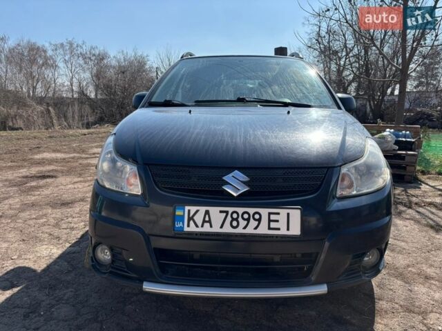 Черный Сузуки СХ4, объемом двигателя 1.59 л и пробегом 382 тыс. км за 2200 $, фото 1 на Automoto.ua