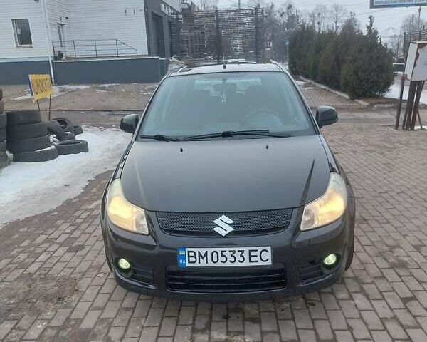 Черный Сузуки СХ4, объемом двигателя 1.91 л и пробегом 212 тыс. км за 5300 $, фото 1 на Automoto.ua