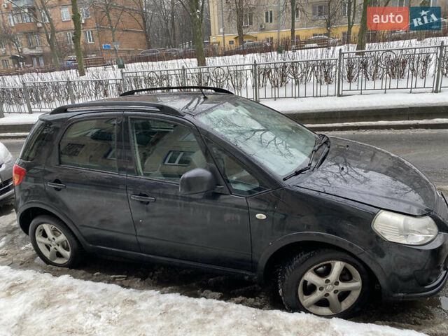 Черный Сузуки СХ4, объемом двигателя 1.59 л и пробегом 214 тыс. км за 6500 $, фото 1 на Automoto.ua