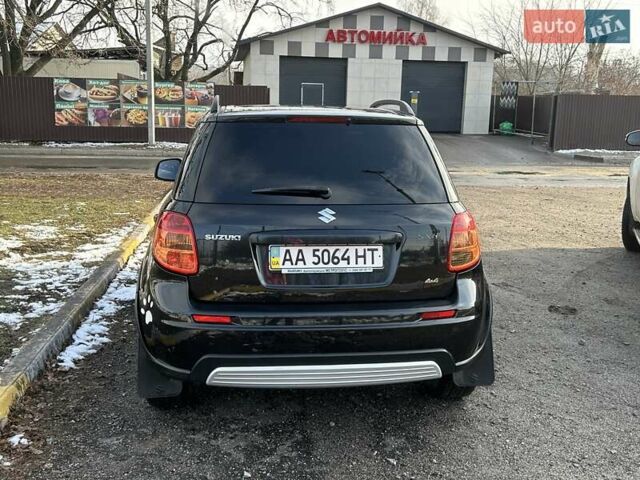 Черный Сузуки СХ4, объемом двигателя 1.59 л и пробегом 170 тыс. км за 8200 $, фото 1 на Automoto.ua