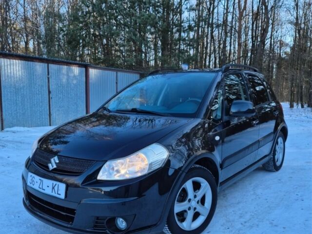 Черный Сузуки СХ4, объемом двигателя 1.6 л и пробегом 209 тыс. км за 2200 $, фото 1 на Automoto.ua