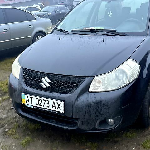 Черный Сузуки СХ4, объемом двигателя 1.6 л и пробегом 167 тыс. км за 5000 $, фото 1 на Automoto.ua