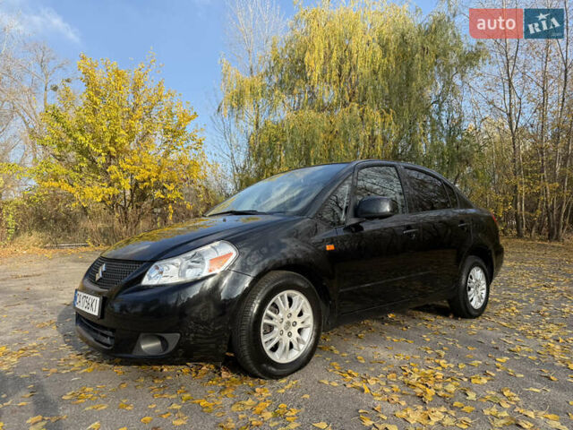 Черный Сузуки СХ4, объемом двигателя 2 л и пробегом 240 тыс. км за 8500 $, фото 1 на Automoto.ua