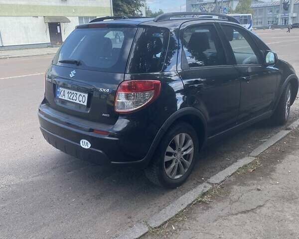 Черный Сузуки СХ4, объемом двигателя 2 л и пробегом 193 тыс. км за 8200 $, фото 1 на Automoto.ua