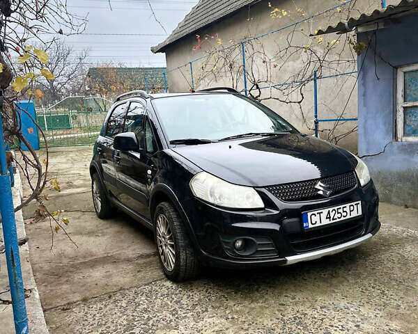 Черный Сузуки СХ4, объемом двигателя 1.6 л и пробегом 196 тыс. км за 3900 $, фото 1 на Automoto.ua
