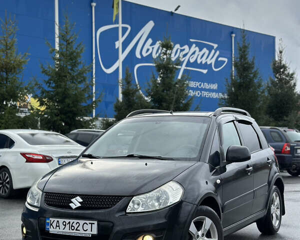 Черный Сузуки СХ4, объемом двигателя 1.59 л и пробегом 211 тыс. км за 7700 $, фото 1 на Automoto.ua