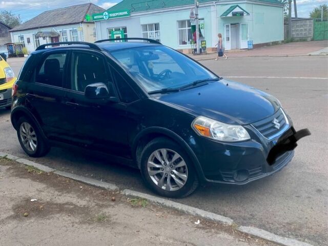 Черный Сузуки СХ4, объемом двигателя 2 л и пробегом 193 тыс. км за 8200 $, фото 1 на Automoto.ua