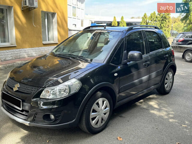 Черный Сузуки СХ4, объемом двигателя 1.6 л и пробегом 175 тыс. км за 8700 $, фото 1 на Automoto.ua