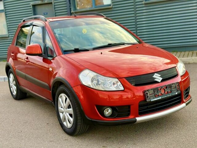 Красный Сузуки СХ4, объемом двигателя 1.6 л и пробегом 137 тыс. км за 7333 $, фото 1 на Automoto.ua
