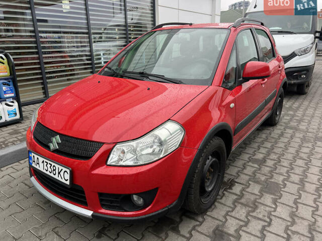 Красный Сузуки СХ4, объемом двигателя 1.59 л и пробегом 232 тыс. км за 7300 $, фото 1 на Automoto.ua