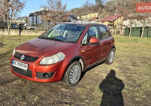 Красный Сузуки СХ4, объемом двигателя 1.5 л и пробегом 123 тыс. км за 4300 $, фото 1 на Automoto.ua