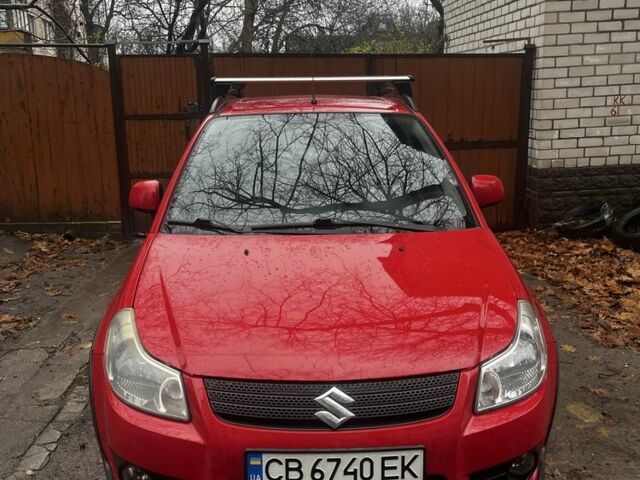 Красный Сузуки СХ4, объемом двигателя 1.6 л и пробегом 183 тыс. км за 6800 $, фото 1 на Automoto.ua