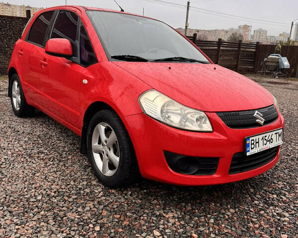 Красный Сузуки СХ4, объемом двигателя 1.59 л и пробегом 183 тыс. км за 6700 $, фото 1 на Automoto.ua