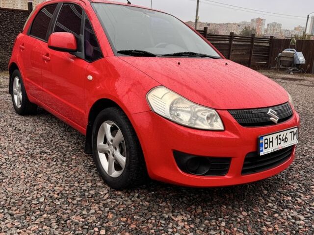 Красный Сузуки СХ4, объемом двигателя 1.6 л и пробегом 183 тыс. км за 6700 $, фото 1 на Automoto.ua