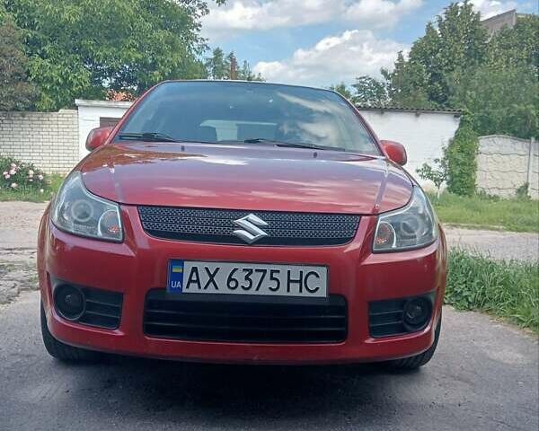Красный Сузуки СХ4, объемом двигателя 1.6 л и пробегом 222 тыс. км за 7000 $, фото 1 на Automoto.ua