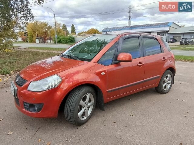 Красный Сузуки СХ4, объемом двигателя 1.6 л и пробегом 112 тыс. км за 4700 $, фото 1 на Automoto.ua