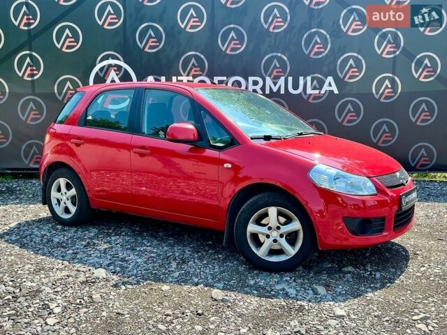 Красный Сузуки СХ4, объемом двигателя 1.6 л и пробегом 309 тыс. км за 6690 $, фото 1 на Automoto.ua