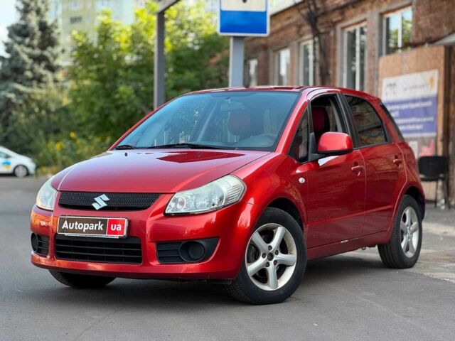 Красный Сузуки СХ4, объемом двигателя 1.6 л и пробегом 281 тыс. км за 5190 $, фото 1 на Automoto.ua