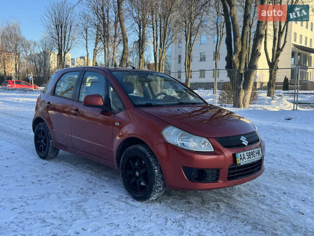 Красный Сузуки СХ4, объемом двигателя 1.6 л и пробегом 182 тыс. км за 6500 $, фото 1 на Automoto.ua