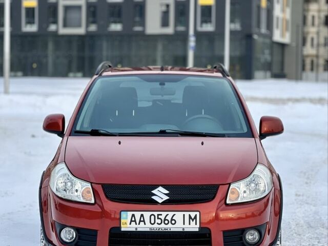 Красный Сузуки СХ4, объемом двигателя 1.6 л и пробегом 215 тыс. км за 7500 $, фото 1 на Automoto.ua