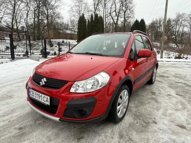 Красный Сузуки СХ4, объемом двигателя 1.6 л и пробегом 131 тыс. км за 8769 $, фото 1 на Automoto.ua