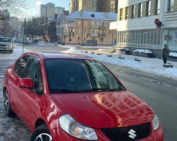 Красный Сузуки СХ4, объемом двигателя 1.6 л и пробегом 415 тыс. км за 4000 $, фото 1 на Automoto.ua