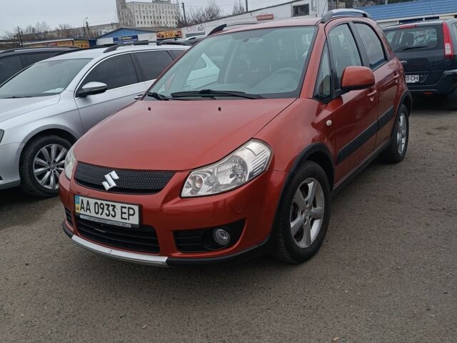 Красный Сузуки СХ4, объемом двигателя 1.6 л и пробегом 190 тыс. км за 6500 $, фото 1 на Automoto.ua