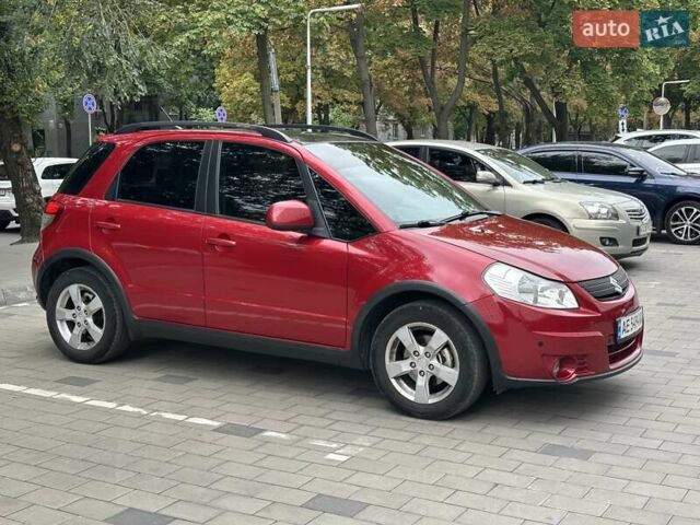Червоний Сузукі СХ4, об'ємом двигуна 2 л та пробігом 200 тис. км за 9500 $, фото 1 на Automoto.ua