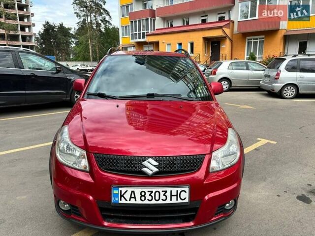Красный Сузуки СХ4, объемом двигателя 2 л и пробегом 254 тыс. км за 11500 $, фото 1 на Automoto.ua