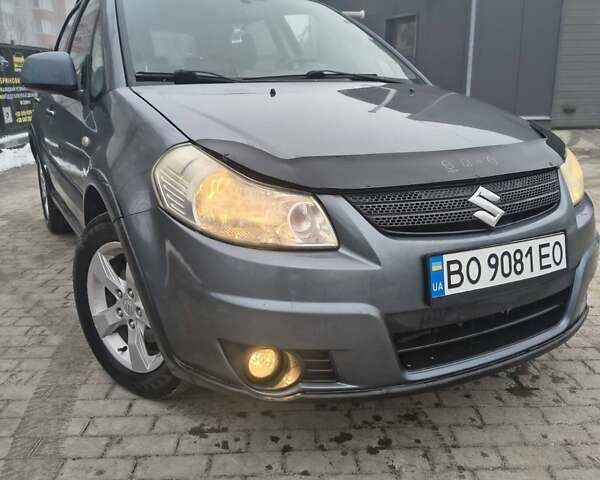 Серый Сузуки СХ4, объемом двигателя 1.6 л и пробегом 243 тыс. км за 5000 $, фото 1 на Automoto.ua