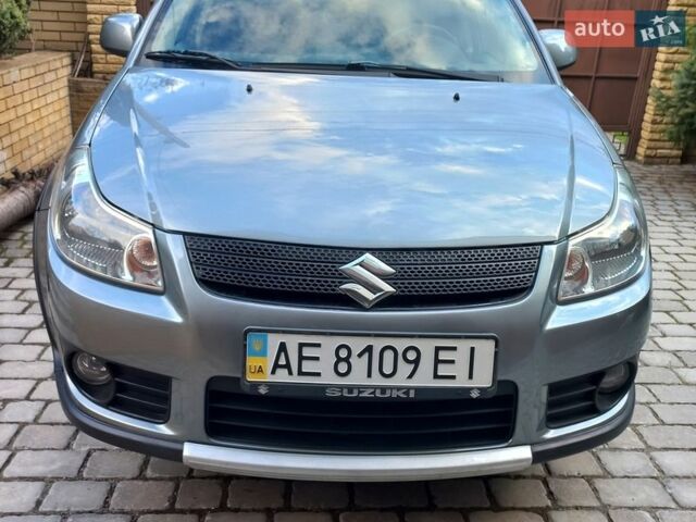 Серый Сузуки СХ4, объемом двигателя 1.59 л и пробегом 86 тыс. км за 7000 $, фото 1 на Automoto.ua