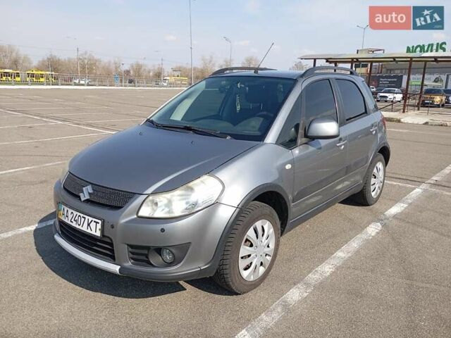 Серый Сузуки СХ4, объемом двигателя 1.6 л и пробегом 300 тыс. км за 5700 $, фото 1 на Automoto.ua