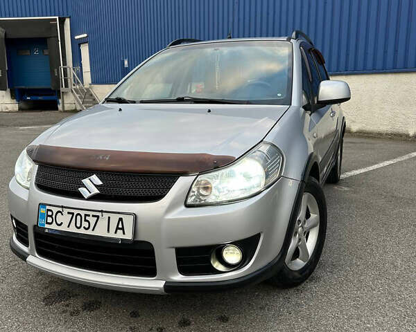 Сірий Сузукі СХ4, об'ємом двигуна 1.59 л та пробігом 234 тис. км за 7450 $, фото 1 на Automoto.ua
