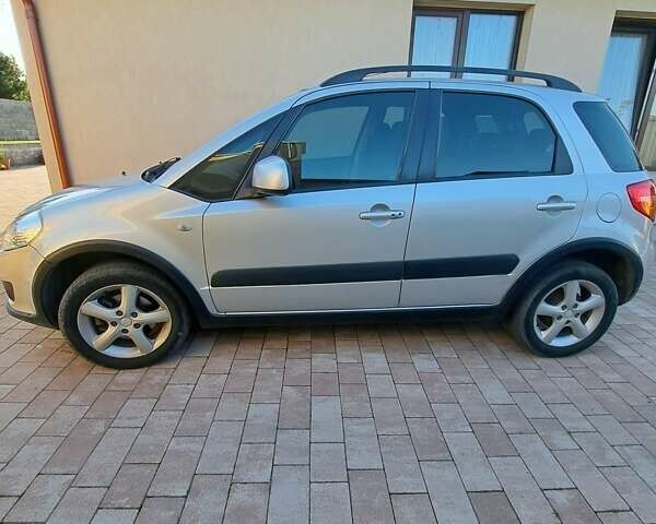 Серый Сузуки СХ4, объемом двигателя 1.59 л и пробегом 272 тыс. км за 6500 $, фото 1 на Automoto.ua